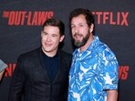 LOS ANGELES, CALIFORNIA - JUNE 26: (L-R) Adam DeVine and Adam Sandler attend the Los Angeles Premiere Of Netflix's "The Out-Laws" at Regal LA Live on June 26, 2023 in Los Angeles, California.   