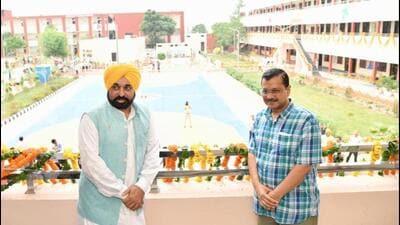 Aam Aadmi Party national convener and Delhi chief minister Arvind Kejriwal with Punjab CM Bhagwant Mann after inaugurating the state’s “first School of Eminence” in Amritsar on Wednesday. (Sameer Sehgal/HT)