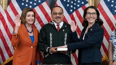FILE - Speaker of the House Nancy Pelosi of Calif., left, administers the House oath of office to Rep. Mary Peltola, D-Alaska, standing next to her husband Eugene "Buzzy" Peltola Jr., center, during a ceremonial swearing-in on Capitol Hill in Washington, Tuesday, Sept. 13, 2022. Peltola's husband Eugene has died in an airplane crash in Alaska, her office said Wednesday, Sept. 13, 2023. (AP) FILE - Speaker of the House Nancy Pelosi of Calif., left, administers the House oath of office to Rep. Mary Peltola, D-Alaska, standing next to her husband Eugene "Buzzy" Peltola Jr., center, during a ceremonial swearing-in on Capitol Hill in Washington, Tuesday, Sept. 13, 2022. Peltola's husband Eugene has died in an airplane crash in Alaska, her office said Wednesday, Sept. 13, 2023. (AP)