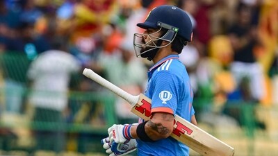 India's Virat Kohli walks back to the pavilion after his dismissal (AFP)