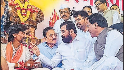 Chief minister Eknath Shinde with Manoj Jarange-Patil in Jalna district on Thursday. (PTI)