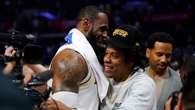 Los Angeles Lakers forward LeBron James, left, greets rapper Jay-Z after an NBA basketball game (AP) Los Angeles Lakers forward LeBron James, left, greets rapper Jay-Z after an NBA basketball game (AP)