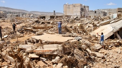 Search teams are combing streets, wrecked buildings, and even the sea to look for bodies in Derna, where the collapse of two dams unleashed a massive flash flood that killed thousands of people. (AP Photo) Search teams are combing streets, wrecked buildings, and even the sea to look for bodies in Derna, where the collapse of two dams unleashed a massive flash flood that killed thousands of people. (AP Photo)