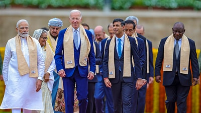 Prime Minister Narendra Modi with US President Joe Biden, United Kingdom's Prime Minister Rishi Sunak and other leaders at Mahatma Gandhi's memorial Rajghat on the final day of the G20 Summit. (PTI) Prime Minister Narendra Modi with US President Joe Biden, United Kingdom's Prime Minister Rishi Sunak and other leaders at Mahatma Gandhi's memorial Rajghat on the final day of the G20 Summit. (PTI)