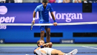 Daniil Medvedev reacts after falling during the US Open men's singles final match against Novak Djokovic. (AFP) Daniil Medvedev reacts after falling during the US Open men's singles final match against Novak Djokovic. (AFP)