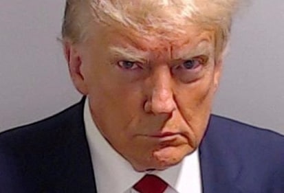 FILE PHOTO: Former U.S. President Donald Trump is shown in a police booking mugshot released by the Fulton County Sheriff's Office, after a Grand Jury brought back indictments against him and 18 of his allies in their attempt to overturn the state's 2020 election results in Atlanta, Georgia, U.S., August 24, 2023. Fulton County Sheriff's Office/Handout via REUTERS. (via REUTERS)