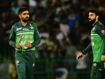 Pakistan's captain Babar Azam (L) reacts as he walks back to the pavilion after Sri Lanka's victory by 2 wickets Pakistan's captain Babar Azam (L) reacts as he walks back to the pavilion after Sri Lanka's victory by 2 wickets