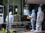 Health workers shift people who have been in contact with a person infected with the Nipah virus to an isolation center at a government hospital in Kozhikode, Kerala. (AFP Photo)