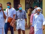 People wear masks at a medical college after the Nipah virus alert, in Kozhikode, Tuesday, Sept. 12.