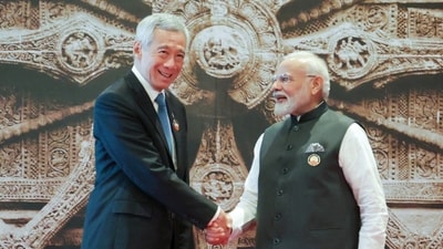 PM Narendra Modi, right, shakes hand with Singapore's Prime Minister Lee Hsien Loong (HT Photo) (Hindustan Times) PM Narendra Modi, right, shakes hand with Singapore's Prime Minister Lee Hsien Loong (HT Photo) (Hindustan Times)