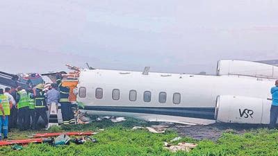 Mumbai, India - Sep 14, 2023 : Officials gather around a damaged aircraft after it veered off the runway with six passengers and two crew members on board at the Mumbai airport amid heavy rains, in Mumbai, India, Thursday, Sep 14, 2023. (Photo by /HT Photo) Mumbai, India - Sep 14, 2023 : Officials gather around a damaged aircraft after it veered off the runway with six passengers and two crew members on board at the Mumbai airport amid heavy rains, in Mumbai, India, Thursday, Sep 14, 2023. (Photo by /HT Photo)