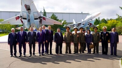 In this photo released by the governor of the Russian far eastern region of Khabarovsky Krai region Mikhail Degtyarev telegram channel, North Korean leader Kim Jong Un, center, poses for a photo after visiting Russian aircraft plant that builds fighter jets in Komsomolsk-on-Amur, about 6,200 kilometers (3,900 miles) east of Moscow, Russia. (The governor of the Russian far eastern region of Khabarovsky Krai region Mikhail Degtyarev telegram channel via AP) (AP) In this photo released by the governor of the Russian far eastern region of Khabarovsky Krai region Mikhail Degtyarev telegram channel, North Korean leader Kim Jong Un, center, poses for a photo after visiting Russian aircraft plant that builds fighter jets in Komsomolsk-on-Amur, about 6,200 kilometers (3,900 miles) east of Moscow, Russia. (The governor of the Russian far eastern region of Khabarovsky Krai region Mikhail Degtyarev telegram channel via AP) (AP)