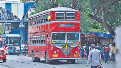 On Friday, the regular double-decker buses, which started operations in 1937, ended their streak on the city roads. To mark the day, BEST decorated the last bus that ran between Agarkar Chowk and Seepz. Sources in BEST said that the last bus, which carried out 34 trips, was then taken to Marol depot for the last time. (Vijay Bate/HT Photo) On Friday, the regular double-decker buses, which started operations in 1937, ended their streak on the city roads. To mark the day, BEST decorated the last bus that ran between Agarkar Chowk and Seepz. Sources in BEST said that the last bus, which carried out 34 trips, was then taken to Marol depot for the last time. (Vijay Bate/HT Photo)
