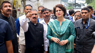 AICC General Secretary Priyanka Gandhi Vadra with Himachal Pradesh CM Sukhvinder Singh Sukhu inspects damage caused by rain-triggered landslide at Krishna Nagar in Shimla on Wednesday. (PTI) AICC General Secretary Priyanka Gandhi Vadra with Himachal Pradesh CM Sukhvinder Singh Sukhu inspects damage caused by rain-triggered landslide at Krishna Nagar in Shimla on Wednesday. (PTI)