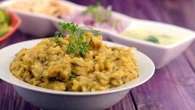 Moong dal ki khichdi: The simple preparation just needs two main ingredients moong dal and rice, cooked with salt, turmeric and spices. The khichdi is topped with desi ghee before being offered to Lord Vishwakarma. (Pinterest) Moong dal ki khichdi: The simple preparation just needs two main ingredients moong dal and rice, cooked with salt, turmeric and spices. The khichdi is topped with desi ghee before being offered to Lord Vishwakarma. (Pinterest)