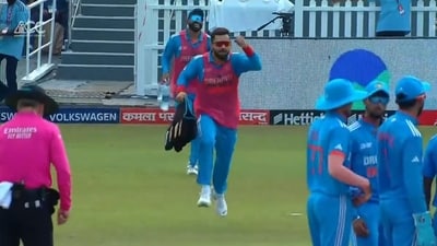 Virat Kohli carrying drinks during the Asia Cup Super 4 match (Hotstar) Virat Kohli carrying drinks during the Asia Cup Super 4 match (Hotstar)
