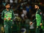 Pakistan's captain Babar Azam (L) reacts as he walks back to the pavilion after Sri Lanka's victory by 2 wickets after the Asia Cup 2023 Super 4 match