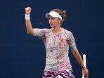 Barbora Krejcikova, of the Czech Republic, celebrates after defeating Danielle Collins, of the United States, in a semifinal match at the San Diego Open tennis tournament