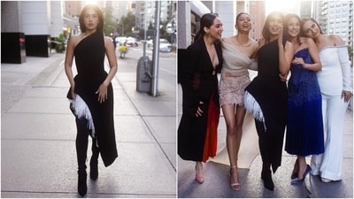 Coming to Bhumi's ensemble for the photoshoot, the actor wore a black one-shoulder sleeveless dress featuring an asymmetric hem adorned with white tassels, a figure-hugging silhouette, and a raised shoulder detail. She styled the ensemble with thigh-high heeled boots, dainty ear studs, centre-parted open locks, glossy caramel lip shade, subtle eye shadow, kohl-lined eyes, blushed cheeks, beaming highlighter, mascara on the lashes, and feathered brows. (Instagram) Coming to Bhumi's ensemble for the photoshoot, the actor wore a black one-shoulder sleeveless dress featuring an asymmetric hem adorned with white tassels, a figure-hugging silhouette, and a raised shoulder detail. She styled the ensemble with thigh-high heeled boots, dainty ear studs, centre-parted open locks, glossy caramel lip shade, subtle eye shadow, kohl-lined eyes, blushed cheeks, beaming highlighter, mascara on the lashes, and feathered brows. (Instagram)