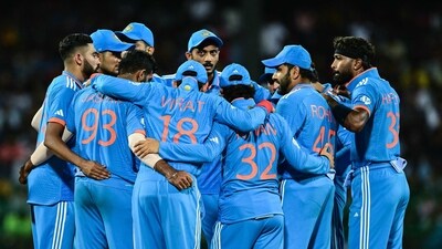 India's captain Rohit Sharma (2R) talks with his teammates (AFP) India's captain Rohit Sharma (2R) talks with his teammates (AFP)