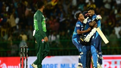 Sri Lanka players celebrate their two wickets win against Pakistan (AFP)