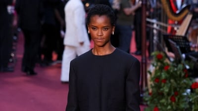 Actor Letitia Wright poses for the paparazzi in an all-black sleek look.&nbsp; (REUTERS)