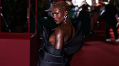 Jodie Turner-Smith stole the spotlight at Vogue World &nbsp;in a Viktor &amp; Rolf statement dress and Jimmy Choo shoes. Embracing risqué fashion, Jodie wore a bow-styled top, black satin gloves, a delicate diamond bracelet, large drop earrings, and a pair of black stilettos. &nbsp; (REUTERS)