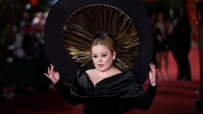 Nicola Coughlan attended the Vogue World in London dressed in a Harris Reedgown and TASAKI jewellery. The actor chose a corseted gown and a head-turning headdress.&nbsp; (REUTERS)