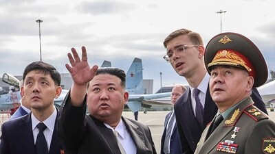 North Korea's leader Kim Jong Un and Russia's Defence Minister Sergei Shoigu visit Knevichi aerodrome near Vladivostok. (AFP)