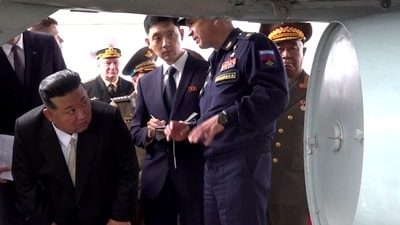 North Korea's leader Kim Jong Un inspects a Russian warplane as he visits Knevichi aerodrome near Vladivostok, Primorsky region. (AFP) North Korea's leader Kim Jong Un inspects a Russian warplane as he visits Knevichi aerodrome near Vladivostok, Primorsky region. (AFP)