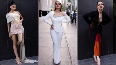 Meanwhile, Kusha Kapila wore an all-white off-the-shoulder full-sleeved blouse and flared pants for the photoshoot. She styled the ensemble with high heels, dangling earrings, and striking glam. Dolly Singh chose an embroidered mini skirt and a wraparound crop blouse with a floor-sweeping train. Lastly, Shibani stunned in a plunging-neck long blazer and a tiered red skirt, styled with a sleek hairdo, on-fleek glam, high heels, and statement earrings. (Instagram) Meanwhile, Kusha Kapila wore an all-white off-the-shoulder full-sleeved blouse and flared pants for the photoshoot. She styled the ensemble with high heels, dangling earrings, and striking glam. Dolly Singh chose an embroidered mini skirt and a wraparound crop blouse with a floor-sweeping train. Lastly, Shibani stunned in a plunging-neck long blazer and a tiered red skirt, styled with a sleek hairdo, on-fleek glam, high heels, and statement earrings. (Instagram)