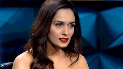 Manushi Chhillar looked stunning in a red dress on sets of KBC. Manushi Chhillar looked stunning in a red dress on sets of KBC.