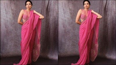 Sobhita's elegant rani pink saree is from the shelves of the clothing brand Torani and comes with a price tag of <span class='webrupee'>₹</span>51,500. (Instagram/@sobhitad) Sobhita's elegant rani pink saree is from the shelves of the clothing brand Torani and comes with a price tag of <span class='webrupee'>₹</span>51,500. (Instagram/@sobhitad)