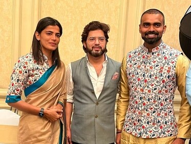 Designer Manish Tripathi with Women Indian Hockey team captain Savita Punia and Indian goalkeeper PR Sreejesh in Asian Games dress (Instagram) Designer Manish Tripathi with Women Indian Hockey team captain Savita Punia and Indian goalkeeper PR Sreejesh in Asian Games dress (Instagram)