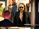 Russell Brand's Viral Critique: Pharma Profits vs. Public Funding During Pandemic (James Manning/PA via AP)