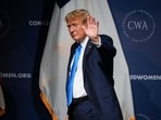 Former President Donald Trump waves to the crowd after speaking at a Concerned Women for America Summit at the Capitol Hilton, Friday, Sept. 15, 2023, in Washington. (AP Photo/Andrew Harnik)