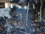Russia-Ukraine War: Firefighters work to extinguish fire at a warehouse destroyed in shelling in the course of Russia-Ukraine conflict in Donetsk.