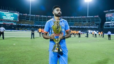 Mohammed Siraj poses with the Asia Cup trophy after India won the final against Sri Lanka by 10 wickets in Colombo (AP) Mohammed Siraj poses with the Asia Cup trophy after India won the final against Sri Lanka by 10 wickets in Colombo (AP)