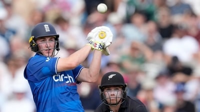 England's Harry Brook plays a shot off the bowling of New Zealand's Rachin Ravindra during the One Day International cricket match between England and New Zealand (AP) England's Harry Brook plays a shot off the bowling of New Zealand's Rachin Ravindra during the One Day International cricket match between England and New Zealand (AP)