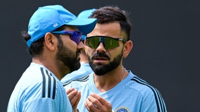 India's captain Rohit Sharma (L) talks with teammate Virat Kohli during a practice session (AFP) India's captain Rohit Sharma (L) talks with teammate Virat Kohli during a practice session (AFP)