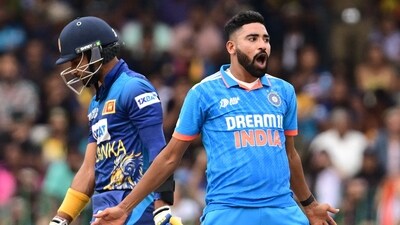 Mohammed Siraj (R) celebrates after taking the wicket of Sri Lanka's captain Dasun Shanaka (AFP) Mohammed Siraj (R) celebrates after taking the wicket of Sri Lanka's captain Dasun Shanaka (AFP)