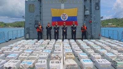 Members of the Colombian Navy stand guard along with three tons of cocaine that were seized in San Andres, Colombia on September 13. (Reuters)