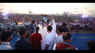 Congress President Mallikarjun Kharge, party leaders Sonia Gandhi and Rahul Gandhi wave at supporters during the 'Vijayabheri' public meeting, at Thukuguda on the outskirts of Hyderabad, Sunday (PTI)