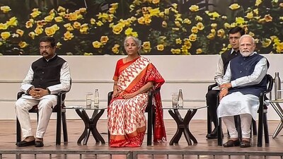 PM Modi with Union Ministers Nirmala Sitharaman and Dharmendra Pradhan during the inauguration of India International Convention and Expo Centre (IICC). (PTI) PM Modi with Union Ministers Nirmala Sitharaman and Dharmendra Pradhan during the inauguration of India International Convention and Expo Centre (IICC). (PTI)