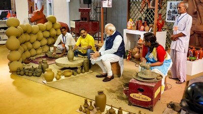 PM Modi visits an exhibition during the inauguration of India International Convention and Expo Centre (IICC). (PTI) PM Modi visits an exhibition during the inauguration of India International Convention and Expo Centre (IICC). (PTI)