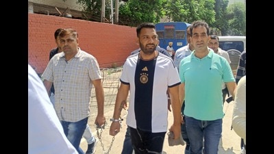 Police Presented gangster Bhuppi Rana in a Panchkula court on Saturday. (Sant Arora/HT) Police Presented gangster Bhuppi Rana in a Panchkula court on Saturday. (Sant Arora/HT)