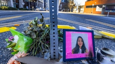 A photo of Jaahnavi Kandula displayed with flowers in Seattle, at the intersection where she was killed by a Seattle Police officer driving north while responding to a nearby medical incident. (AP) A photo of Jaahnavi Kandula displayed with flowers in Seattle, at the intersection where she was killed by a Seattle Police officer driving north while responding to a nearby medical incident. (AP)
