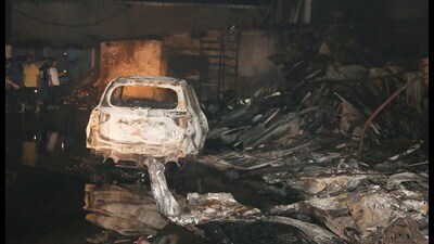 The damaged Toyata showroom in Industrial Area, Chandigarh, on Sunday. (Keshav Singh/HT)