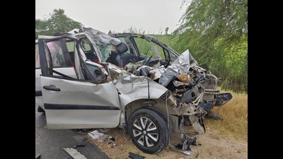 The mangled remains of the car on Sirsa-Malout highway near Khuddian village, Muktsar, on Sunday. (HT Photo)