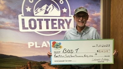 Bud T posing for the camera with his winning amount. (Colorado Lottery) Bud T posing for the camera with his winning amount. (Colorado Lottery)